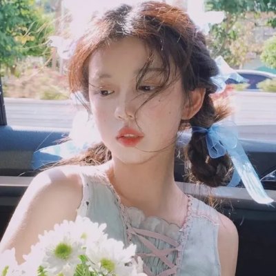 彼女